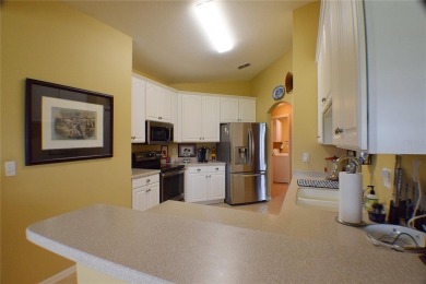 Welcome to this spacious 3-bedroom, 2-bath home offers scenic on Tampa Bay Golf and Country Club in Florida - for sale on GolfHomes.com, golf home, golf lot