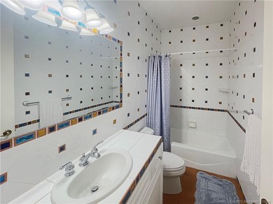 Crane Creek Fortress - Step inside this stunning CBS sanctuary on Martin Downs Country Club in Florida - for sale on GolfHomes.com, golf home, golf lot