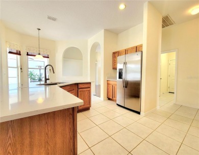 MOTIVATED SELLER! BEAUTIFUL POOL HOME IN A 24-HOUR GUARD GATED on Ridgewood Lakes Golf and Country Club in Florida - for sale on GolfHomes.com, golf home, golf lot