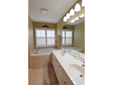 Welcome to this spacious 3-bedroom, 2-bath home offers scenic on Tampa Bay Golf and Country Club in Florida - for sale on GolfHomes.com, golf home, golf lot