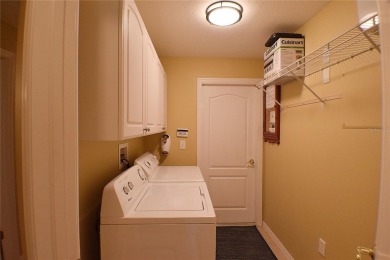 Welcome to this spacious 3-bedroom, 2-bath home offers scenic on Tampa Bay Golf and Country Club in Florida - for sale on GolfHomes.com, golf home, golf lot