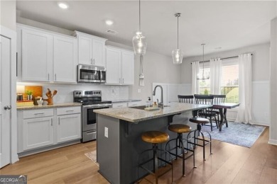 Welcome to this charming home in the highly sought-after on Traditions of Braselton Golf Club in Georgia - for sale on GolfHomes.com, golf home, golf lot