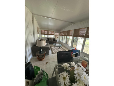 Rarely available lakefront  2BR/2BA double-wide coach home in on Boca Grove Golf and Tennis in Florida - for sale on GolfHomes.com, golf home, golf lot