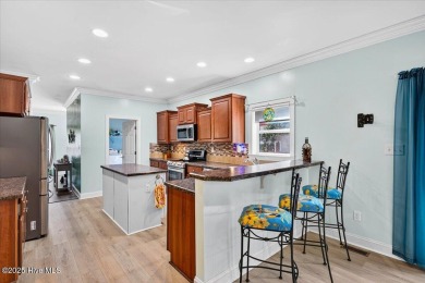 Island Charm at Its Best!
This custom-built furnished coastal on Founders Club At St. James Plantation in North Carolina - for sale on GolfHomes.com, golf home, golf lot