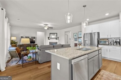 Welcome to this charming home in the highly sought-after on Traditions of Braselton Golf Club in Georgia - for sale on GolfHomes.com, golf home, golf lot