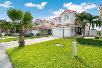 Golf and lake view gem in gated Doral Palms Estates! Enjoy on Jim McLean Signature Course in Florida - for sale on GolfHomes.com, golf home, golf lot