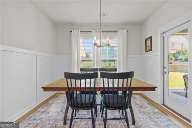 Welcome to this charming home in the highly sought-after on Traditions of Braselton Golf Club in Georgia - for sale on GolfHomes.com, golf home, golf lot