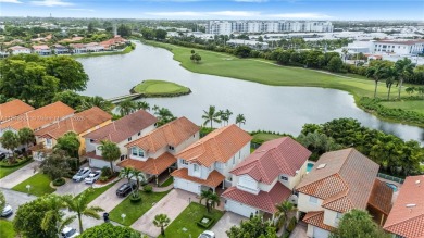 Golf and lake view gem in gated Doral Palms Estates! Enjoy on Jim McLean Signature Course in Florida - for sale on GolfHomes.com, golf home, golf lot