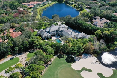 This timeless Euoprean Estate Home sits on 1.6 acres in the on The Bears Club in Florida - for sale on GolfHomes.com, golf home, golf lot