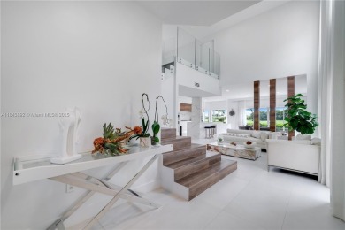 Golf and lake view gem in gated Doral Palms Estates! Enjoy on Jim McLean Signature Course in Florida - for sale on GolfHomes.com, golf home, golf lot