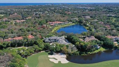 This timeless Euoprean Estate Home sits on 1.6 acres in the on The Bears Club in Florida - for sale on GolfHomes.com, golf home, golf lot