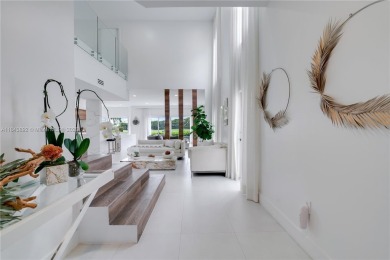 Golf and lake view gem in gated Doral Palms Estates! Enjoy on Jim McLean Signature Course in Florida - for sale on GolfHomes.com, golf home, golf lot