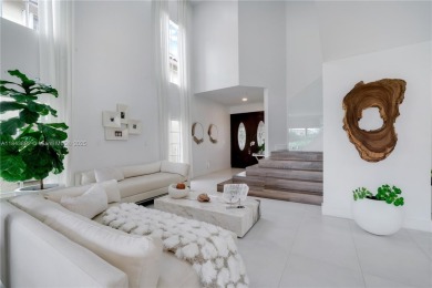 Golf and lake view gem in gated Doral Palms Estates! Enjoy on Jim McLean Signature Course in Florida - for sale on GolfHomes.com, golf home, golf lot