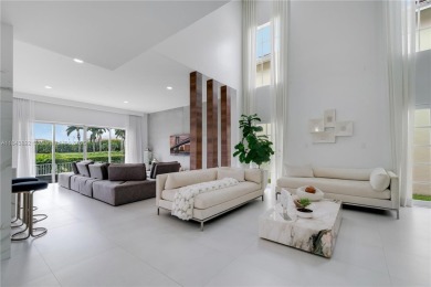 Golf and lake view gem in gated Doral Palms Estates! Enjoy on Jim McLean Signature Course in Florida - for sale on GolfHomes.com, golf home, golf lot