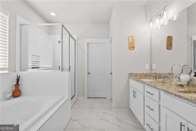 Welcome to this charming home in the highly sought-after on Traditions of Braselton Golf Club in Georgia - for sale on GolfHomes.com, golf home, golf lot