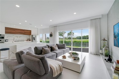 Golf and lake view gem in gated Doral Palms Estates! Enjoy on Jim McLean Signature Course in Florida - for sale on GolfHomes.com, golf home, golf lot