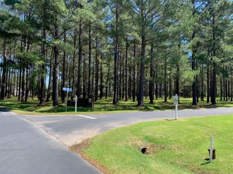 Wooded lot on Lake Arbu Drive that backs up to Players Golf on Players Course At Wyboo Plantation in South Carolina - for sale on GolfHomes.com, golf home, golf lot