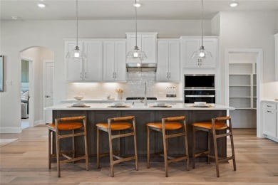 Welcome home to the Driftwood--a beautifully designed Beazer on Heath Golf and Yacht Club in Texas - for sale on GolfHomes.com, golf home, golf lot