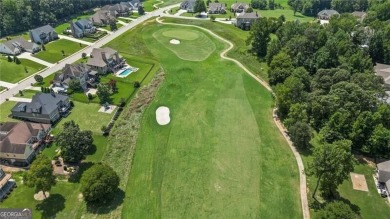 Welcome to this charming home in the highly sought-after on Traditions of Braselton Golf Club in Georgia - for sale on GolfHomes.com, golf home, golf lot