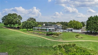 Welcome to this charming home in the highly sought-after on Traditions of Braselton Golf Club in Georgia - for sale on GolfHomes.com, golf home, golf lot