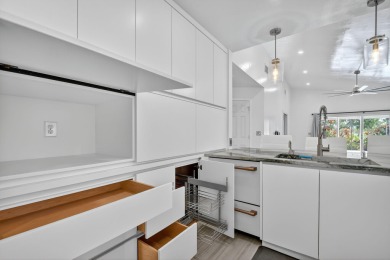 Welcome to this Amazing 3/2 custom home located in Atlantic on Atlantic National Golf and Country Club in Florida - for sale on GolfHomes.com, golf home, golf lot