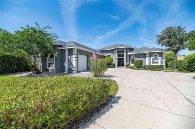 This captivating residence is nestled within the esteemed on Grasslands Golf and Country Club in Florida - for sale on GolfHomes.com, golf home, golf lot