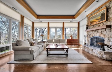 Luxury estate on a private 1.7 acre lot with gentle upslope on Governors Club in North Carolina - for sale on GolfHomes.com, golf home, golf lot