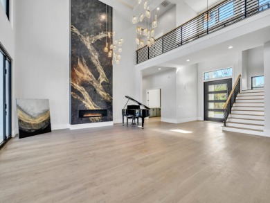 Introducing the epitome of Luxury Waterfront Living- a on Kelly Plantation Golf Club in Florida - for sale on GolfHomes.com, golf home, golf lot
