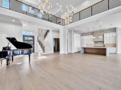 Introducing the epitome of Luxury Waterfront Living- a on Kelly Plantation Golf Club in Florida - for sale on GolfHomes.com, golf home, golf lot