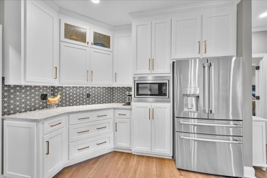 Experience the best of golf and lake living in this 4-bedroom, 2 on The Patriot Golf Club At Grand Harbor in South Carolina - for sale on GolfHomes.com, golf home, golf lot