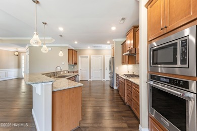 Welcome to this stunning 3-bedroom, 2.5-bathroom home in the on Cape Fear National At Brunswick Forest in North Carolina - for sale on GolfHomes.com, golf home, golf lot