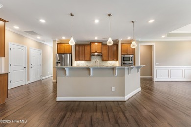 Welcome to this stunning 3-bedroom, 2.5-bathroom home in the on Cape Fear National At Brunswick Forest in North Carolina - for sale on GolfHomes.com, golf home, golf lot