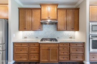 Welcome to this stunning 3-bedroom, 2.5-bathroom home in the on Cape Fear National At Brunswick Forest in North Carolina - for sale on GolfHomes.com, golf home, golf lot