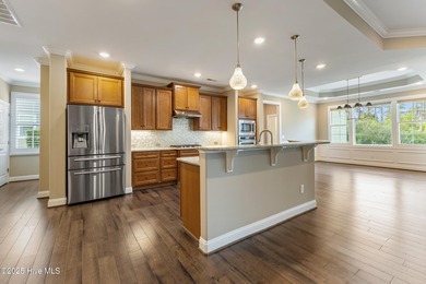 Welcome to this stunning 3-bedroom, 2.5-bathroom home in the on Cape Fear National At Brunswick Forest in North Carolina - for sale on GolfHomes.com, golf home, golf lot