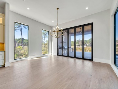 Introducing the epitome of Luxury Waterfront Living- a on Kelly Plantation Golf Club in Florida - for sale on GolfHomes.com, golf home, golf lot