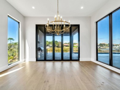 Introducing the epitome of Luxury Waterfront Living- a on Kelly Plantation Golf Club in Florida - for sale on GolfHomes.com, golf home, golf lot