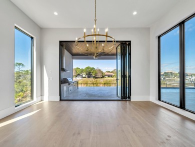 Introducing the epitome of Luxury Waterfront Living- a on Kelly Plantation Golf Club in Florida - for sale on GolfHomes.com, golf home, golf lot