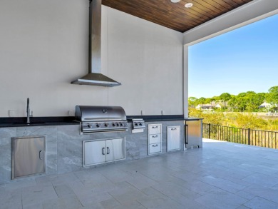 Introducing the epitome of Luxury Waterfront Living- a on Kelly Plantation Golf Club in Florida - for sale on GolfHomes.com, golf home, golf lot
