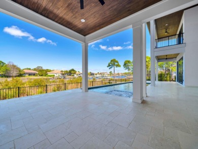 Introducing the epitome of Luxury Waterfront Living- a on Kelly Plantation Golf Club in Florida - for sale on GolfHomes.com, golf home, golf lot