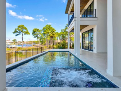 Introducing the epitome of Luxury Waterfront Living- a on Kelly Plantation Golf Club in Florida - for sale on GolfHomes.com, golf home, golf lot