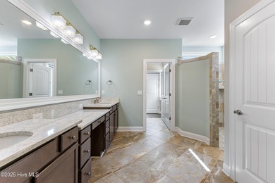 Welcome to this stunning 3-bedroom, 2.5-bathroom home in the on Cape Fear National At Brunswick Forest in North Carolina - for sale on GolfHomes.com, golf home, golf lot