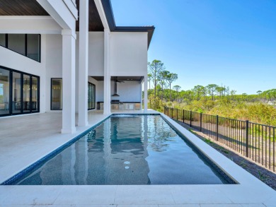 Introducing the epitome of Luxury Waterfront Living- a on Kelly Plantation Golf Club in Florida - for sale on GolfHomes.com, golf home, golf lot
