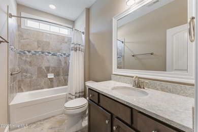 Welcome to this stunning 3-bedroom, 2.5-bathroom home in the on Cape Fear National At Brunswick Forest in North Carolina - for sale on GolfHomes.com, golf home, golf lot