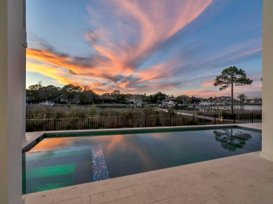 Introducing the epitome of Luxury Waterfront Living- a on Kelly Plantation Golf Club in Florida - for sale on GolfHomes.com, golf home, golf lot