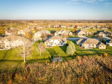 Step into luxury and tranquility with this beautiful 2-story on Newburg Village Golf Club in Illinois - for sale on GolfHomes.com, golf home, golf lot