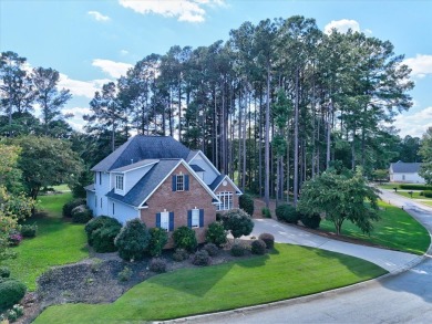 Experience the best of golf and lake living in this 4-bedroom, 2 on The Patriot Golf Club At Grand Harbor in South Carolina - for sale on GolfHomes.com, golf home, golf lot