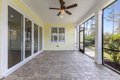 Welcome to this stunning 3-bedroom, 2.5-bathroom home in the on Cape Fear National At Brunswick Forest in North Carolina - for sale on GolfHomes.com, golf home, golf lot