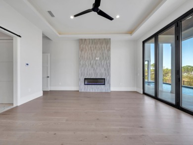 Introducing the epitome of Luxury Waterfront Living- a on Kelly Plantation Golf Club in Florida - for sale on GolfHomes.com, golf home, golf lot