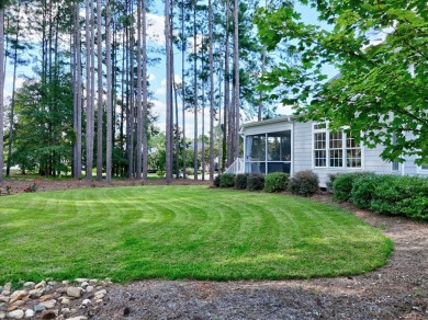 Experience the best of golf and lake living in this 4-bedroom, 2 on The Patriot Golf Club At Grand Harbor in South Carolina - for sale on GolfHomes.com, golf home, golf lot
