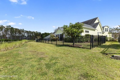 Welcome to this stunning 3-bedroom, 2.5-bathroom home in the on Cape Fear National At Brunswick Forest in North Carolina - for sale on GolfHomes.com, golf home, golf lot